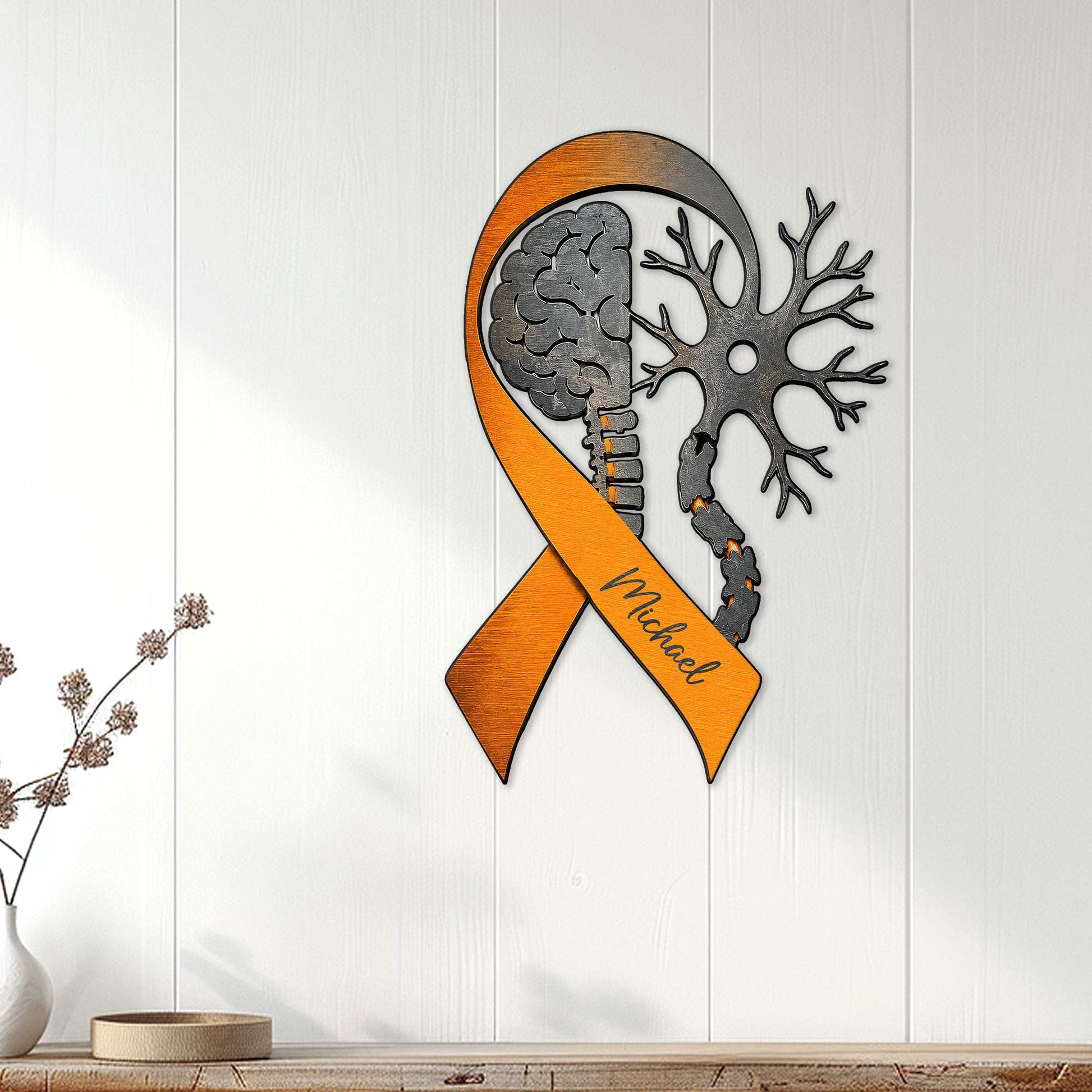 Multiple Sclerosis awareness ribbon sign displayed on a white paneled wall as supportive home decor