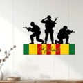 Vietnam Veteran metal wall sign displayed in a bright home interior with three military silhouettes and colorful backdrop
