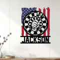 Patriotic dart board wall sign displayed on a light wood-paneled wall in a home decor setting