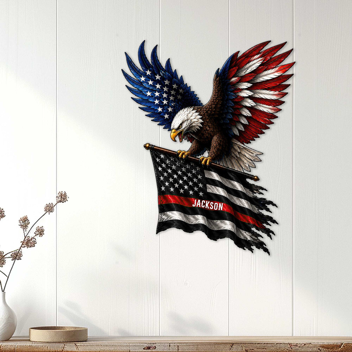 Patriotic firefighter wall sign displayed on a white wood-paneled wall above a console table