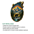 Bear metal sign feature guide showing the mountain wilderness artwork and cut-metal sign details