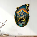 Bear mountain metal sign displayed as rustic wall decor on white wood paneling