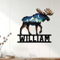 Moose wall sign displayed on a white paneled wall, bringing colorful mountain wildlife decor to a room