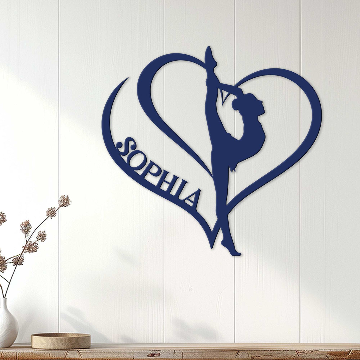 Navy gymnastics metal wall sign displayed on white paneled decor with a graceful athlete silhouette