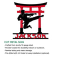 Karate metal sign featuring a black martial artist silhouette performing a high kick beneath a torii gate