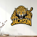 Fierce cheetah wall sign displayed on a light wood-paneled wall in a modern home setting