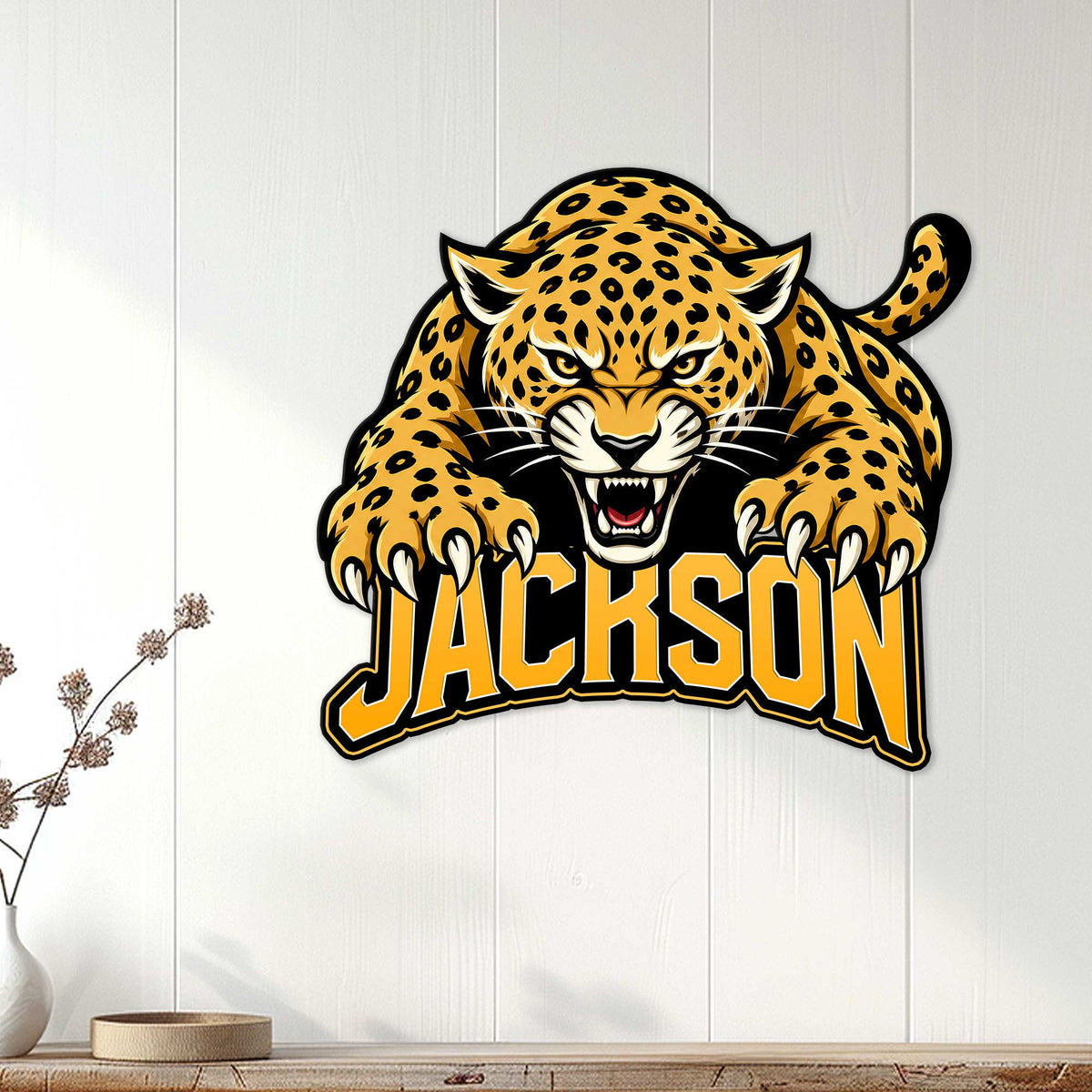 Fierce cheetah wall sign displayed on a light wood-paneled wall in a modern home setting