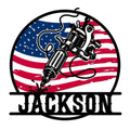 Tattoo artist metal sign featuring a tattoo machine over a distressed American flag design