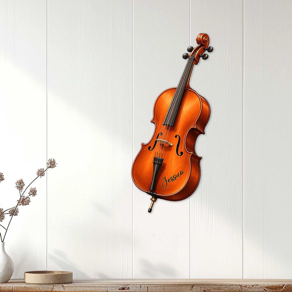 Orange cello wall sign displayed on a white paneled wall as elegant music room decor