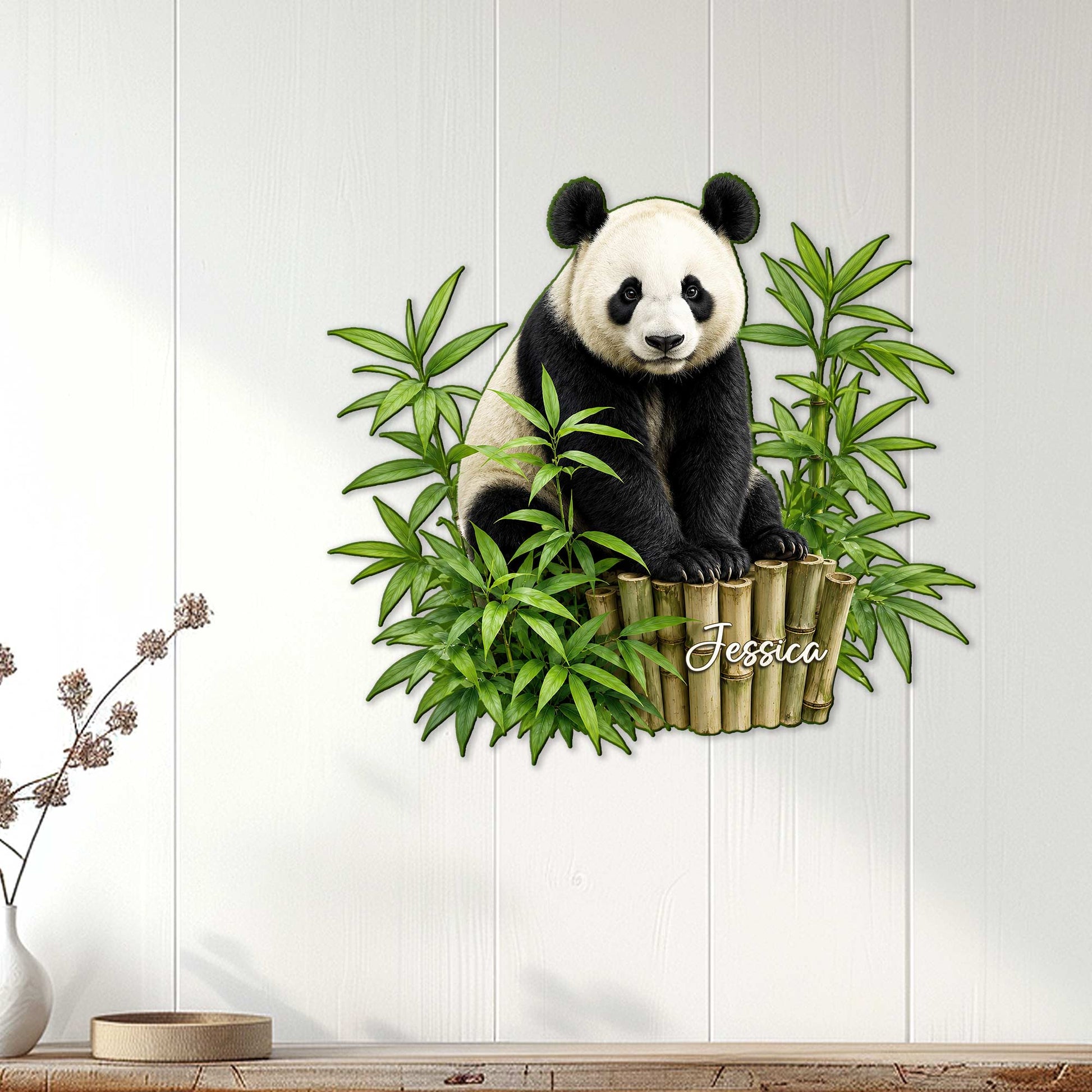 Panda wall decor displayed on a light wood-paneled wall above a console in a bright home setting
