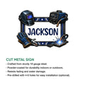 Welder metal sign feature graphic showcasing detailed welding equipment and bold blue workshop artwork