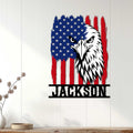 Patriotic eagle wall sign displayed on a bright wood-paneled wall in a home decor setting