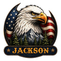 Patriotic eagle metal sign featuring an American flag, mountain peaks, evergreen trees, and a bold eagle portrait