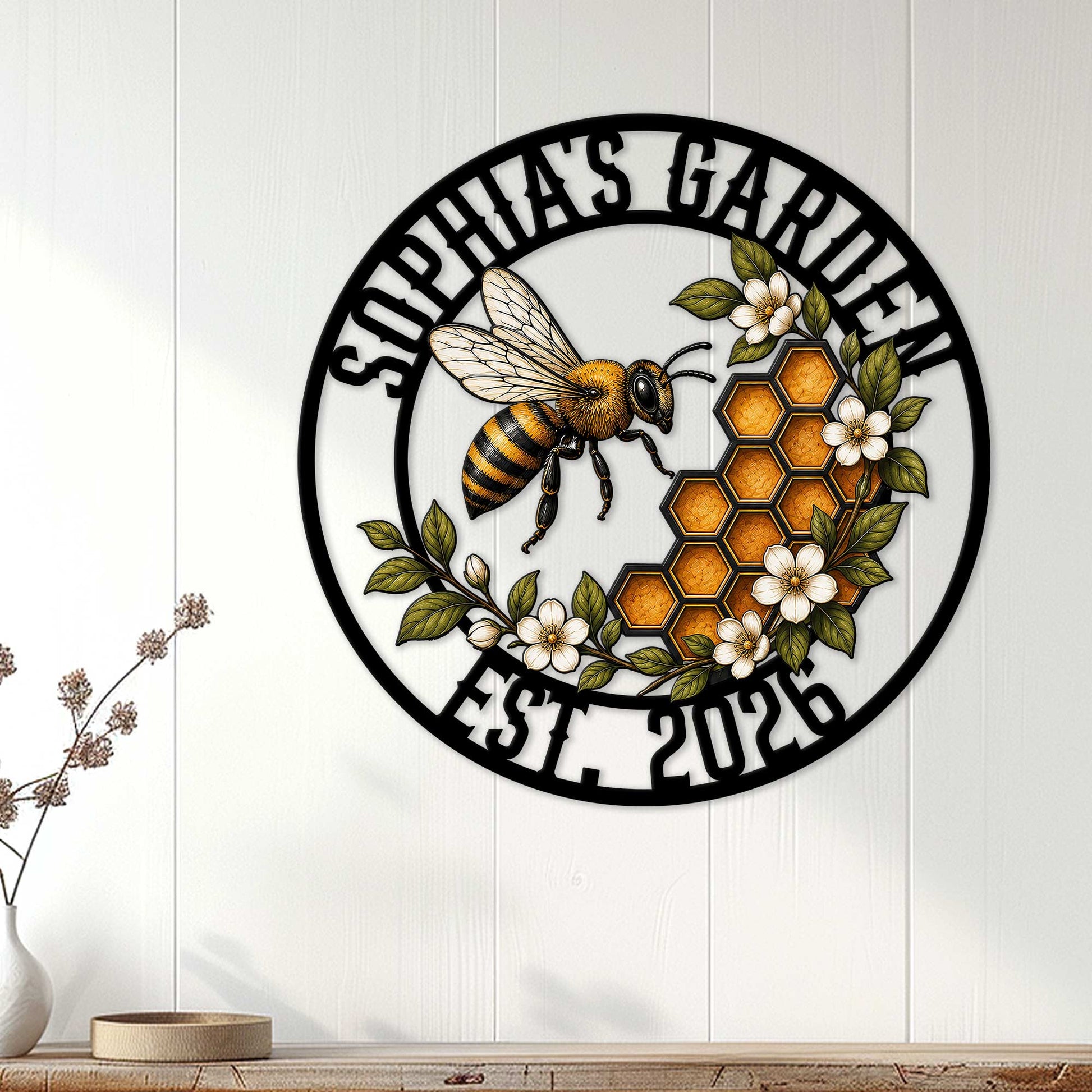 Bee and honeycomb garden sign displayed as wall decor on a white paneled wall