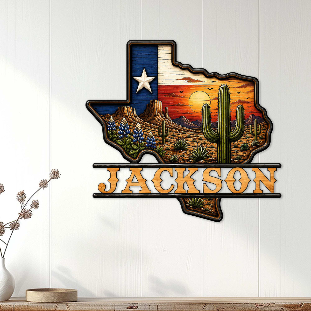 Texas-shaped metal wall sign displayed on a light paneled wall with cactus desert artwork and Lone Star detail