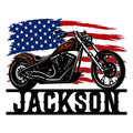 Biker metal sign featuring a bold black cruiser motorcycle against a distressed American flag