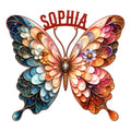 Ornate colorful butterfly metal sign with jewel-toned floral wings and decorative antennae