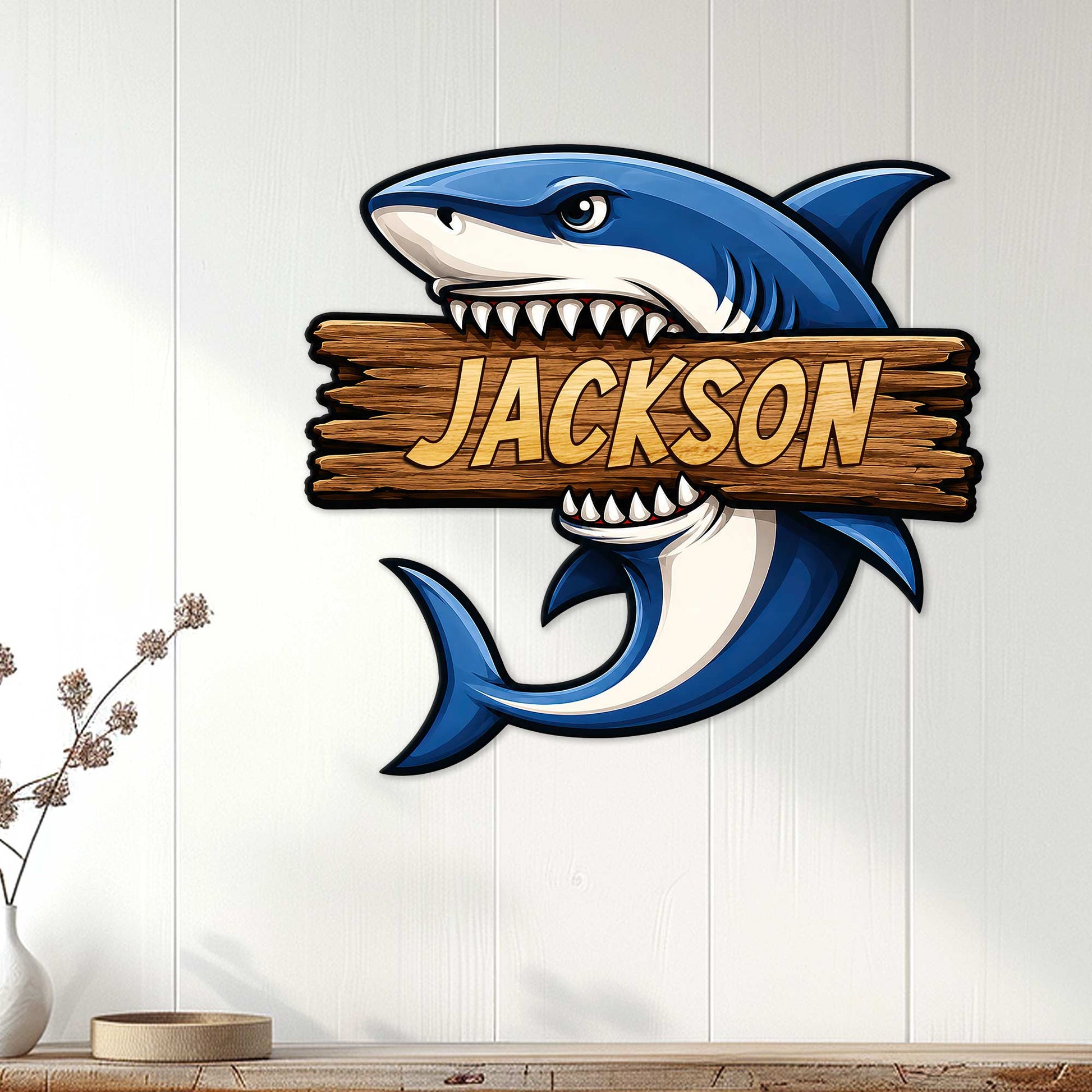 Blue shark metal wall sign displayed on a light paneled wall in a coastal-style room