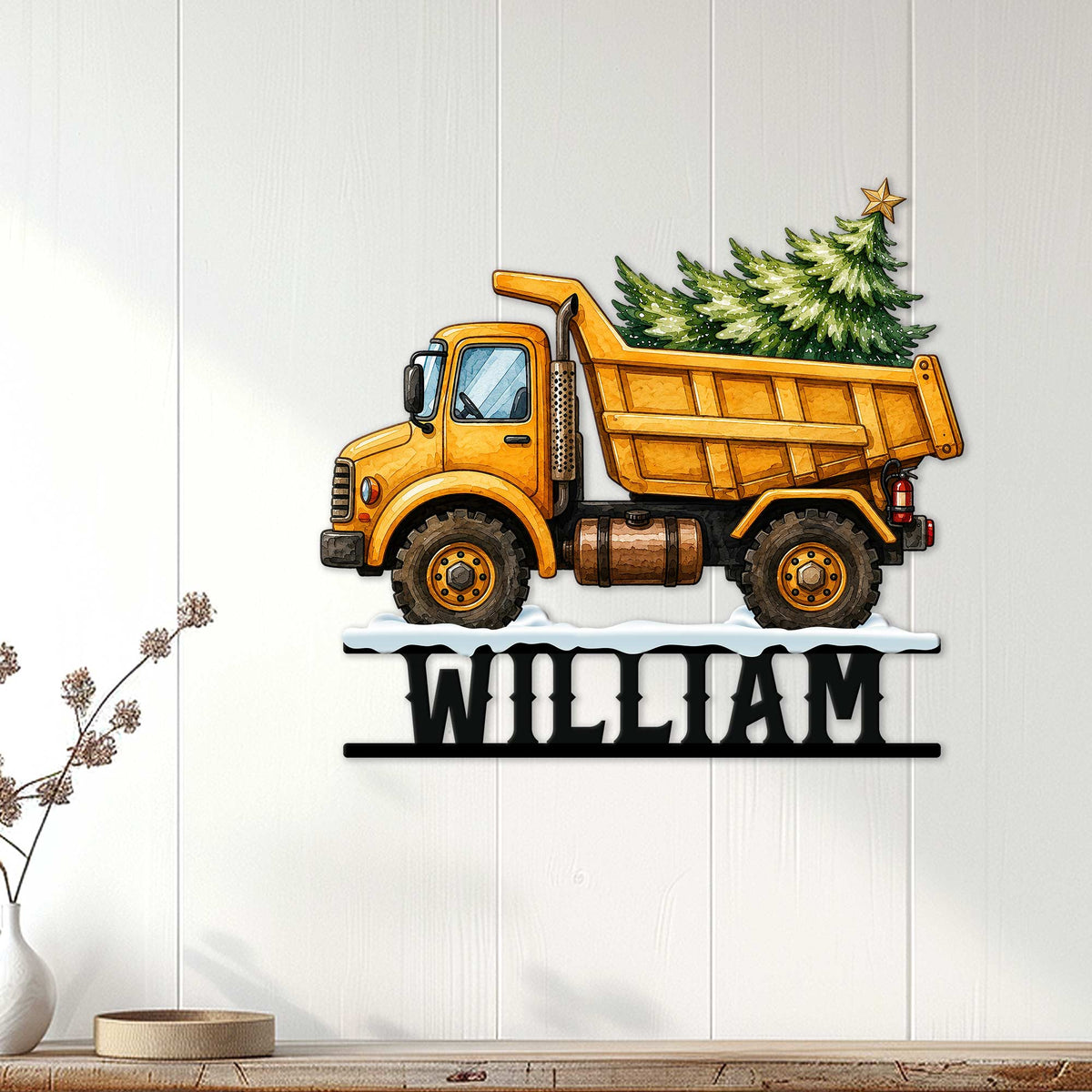 Construction Christmas wall decor featuring a yellow dump truck and tree displayed on a paneled wall