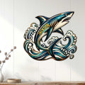 Shark wall sign displayed on white vertical paneling above a console table in a coastal interior