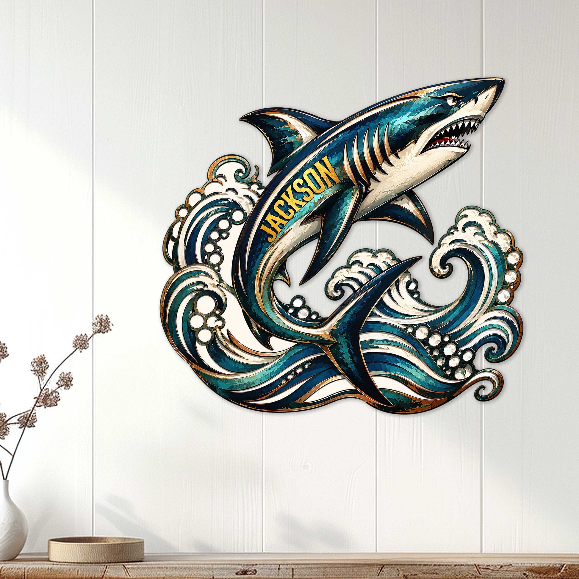 Shark wall sign displayed on white vertical paneling above a console table in a coastal interior