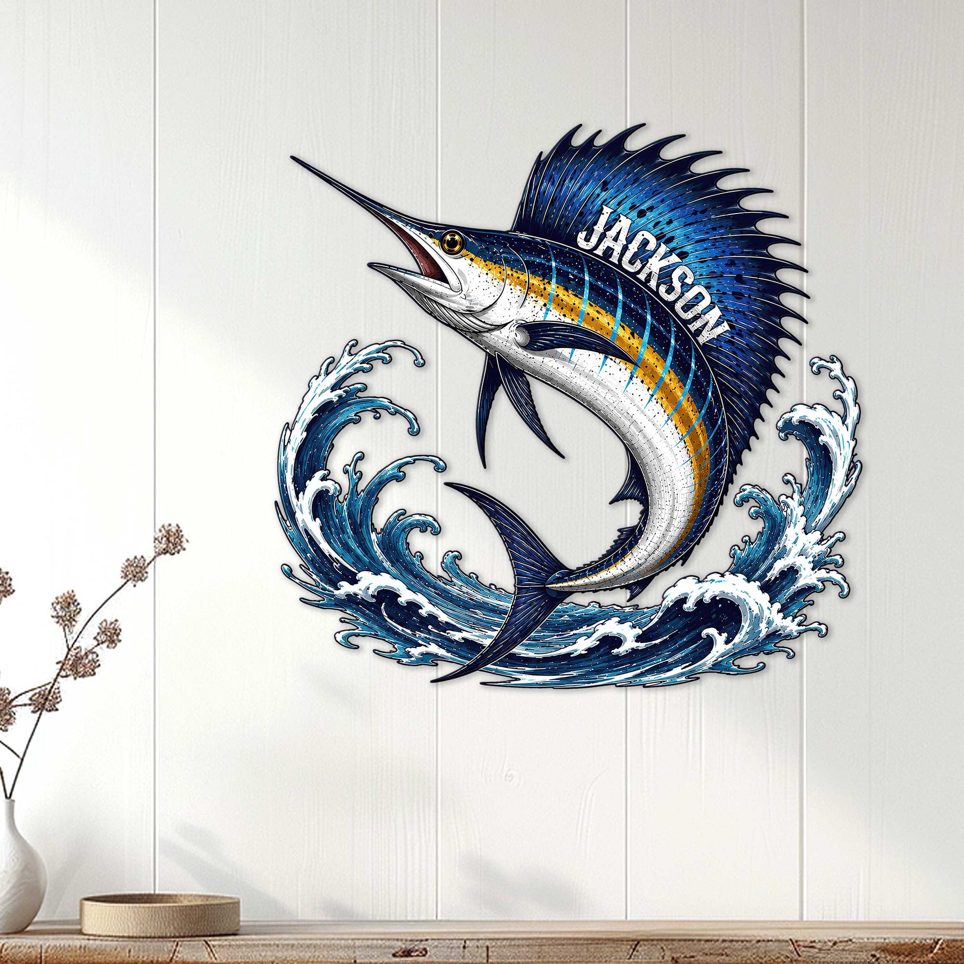 Sailfish metal wall sign displayed on white paneling above a console in coastal home decor