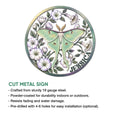 Botanical moth metal sign shown in full with floral framing and an elegant circular design