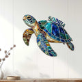 Colorful turtle wall decor displayed on a white paneled interior wall