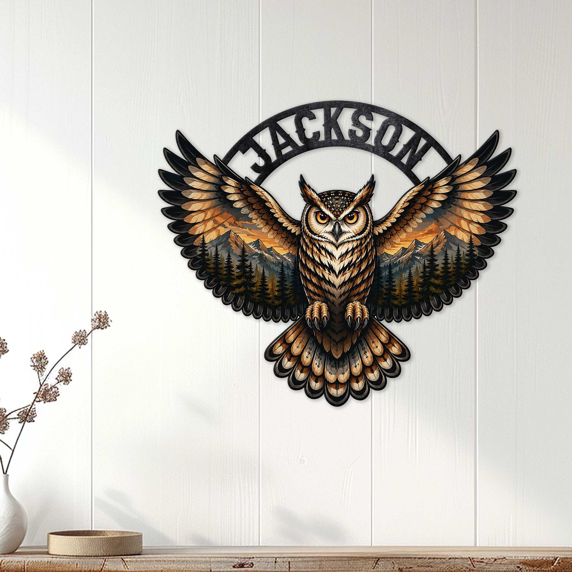 Owl wall decor displayed on white paneling, featuring a detailed owl with mountain and forest scenery