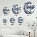 Dragonfly crescent moon metal sign size guide showing six available square dimensions in a home setting