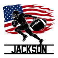Custom American football metal sign featuring a running player silhouette over a distressed patriotic flag design