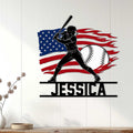 Softball wall decor displayed on a light wood wall, featuring a batter, softball, and American flag