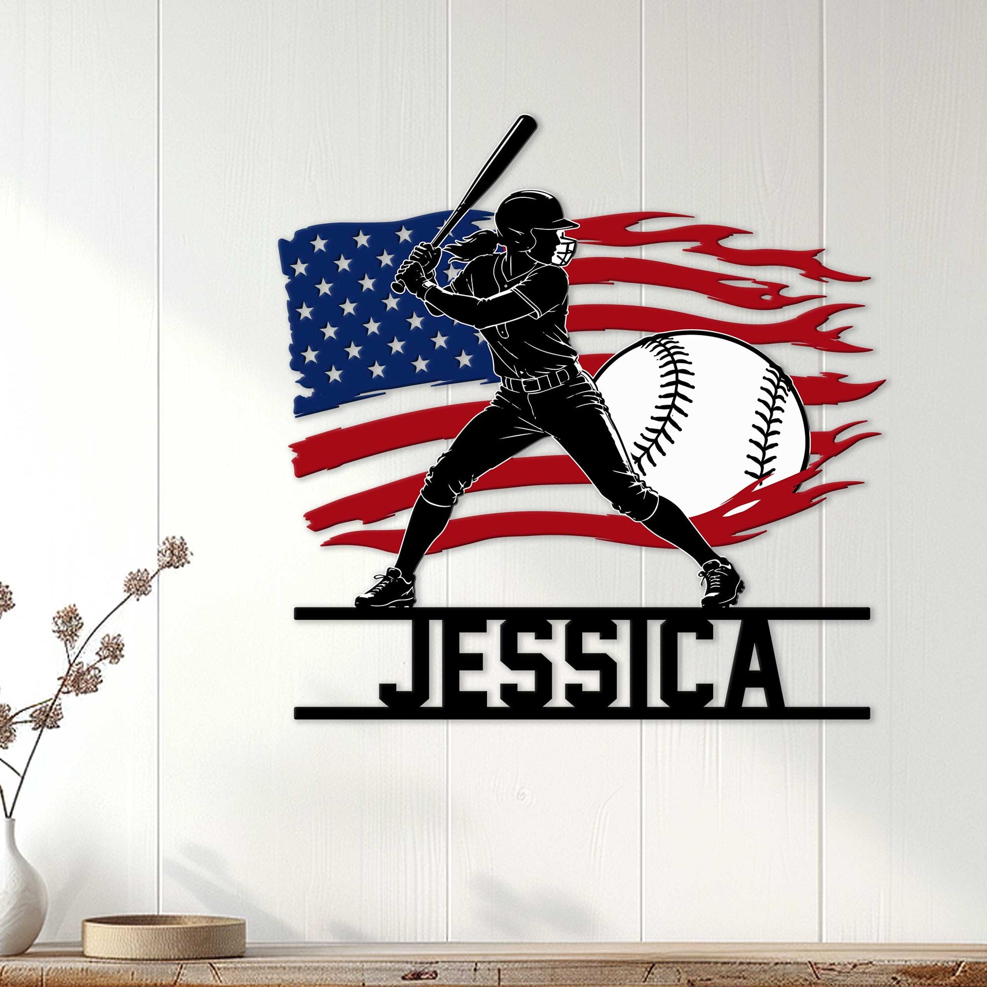 Softball wall decor displayed on a light wood wall, featuring a batter, softball, and American flag