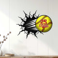Softball wall decor displayed in a home setting with a yellow ball bursting through the wall