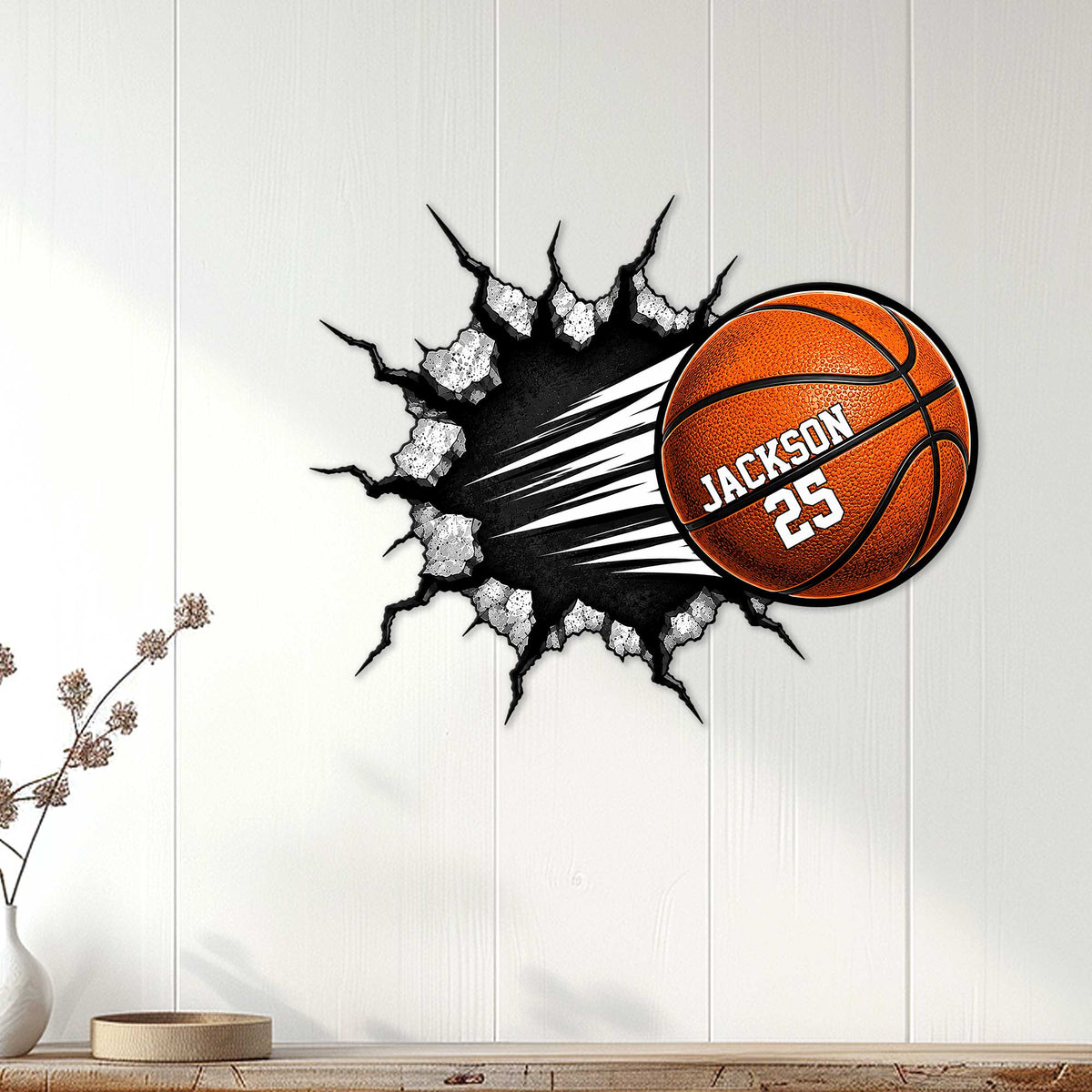 Basketball wall decor displayed on a light wood-paneled wall in a modern room