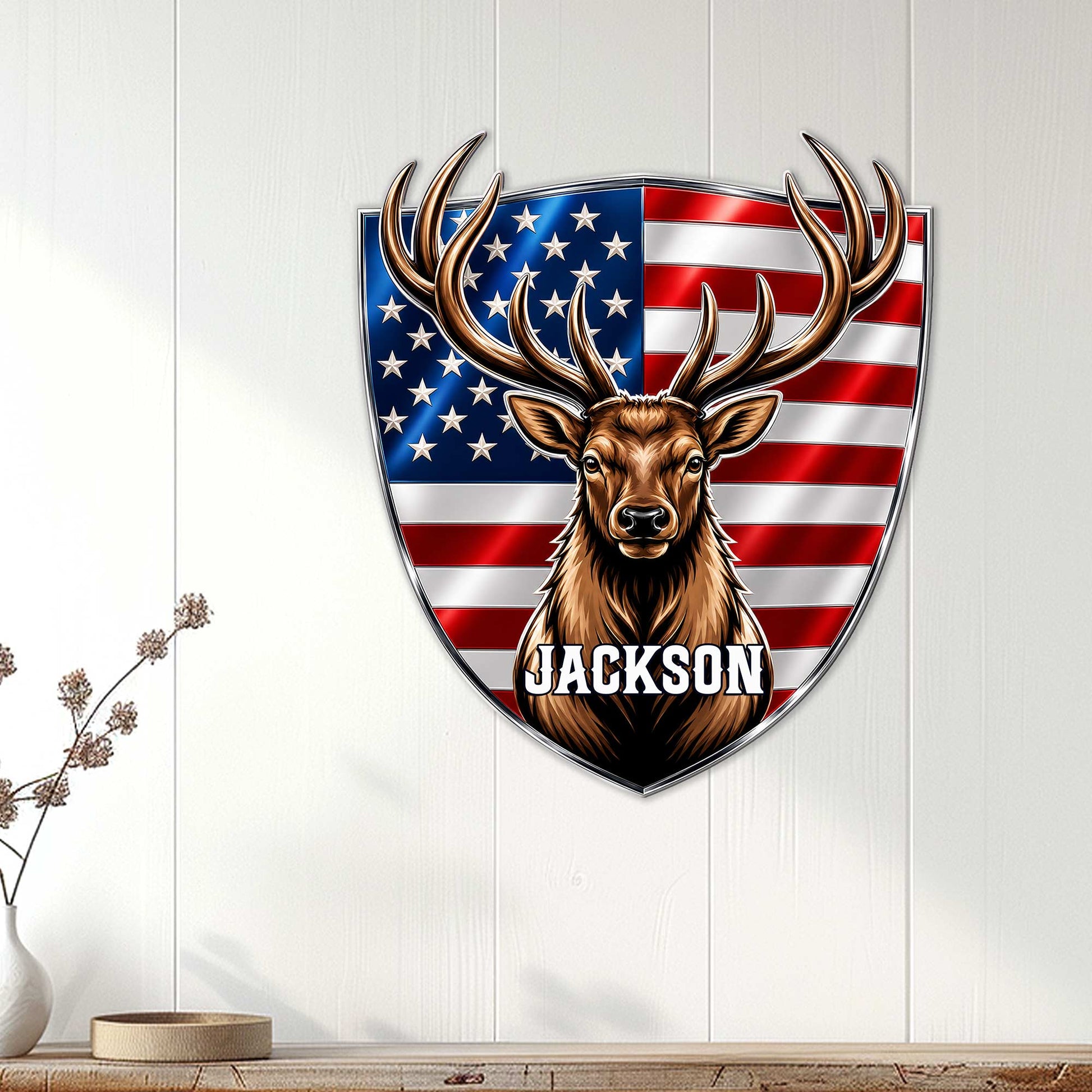 Patriotic deer hunting wall decor displayed on a light wood wall in a home interior