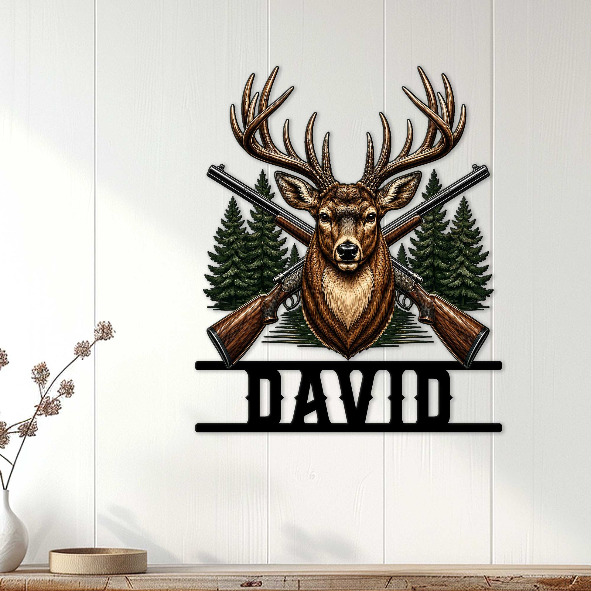 Hunting wall decor displayed on a light wood wall, featuring a deer and crossed rifles in a forest scene