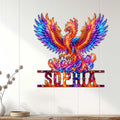Colorful phoenix wall sign displayed as bold decor on a light wood-paneled wall