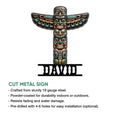 Native-inspired totem pole metal sign shown with a cut-metal design and bold stacked face artwork