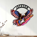 Patriotic eagle guitar wall decor displayed on a white paneled wall in a music room setting