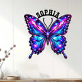Colorful celestial butterfly metal wall decor displayed on a white paneled wall