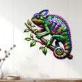 Bright chameleon metal wall sign displayed on a white paneled wall in a home decor setting