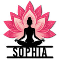 Pink lotus flower metal sign with a black meditating yoga silhouette for peaceful wellness decor