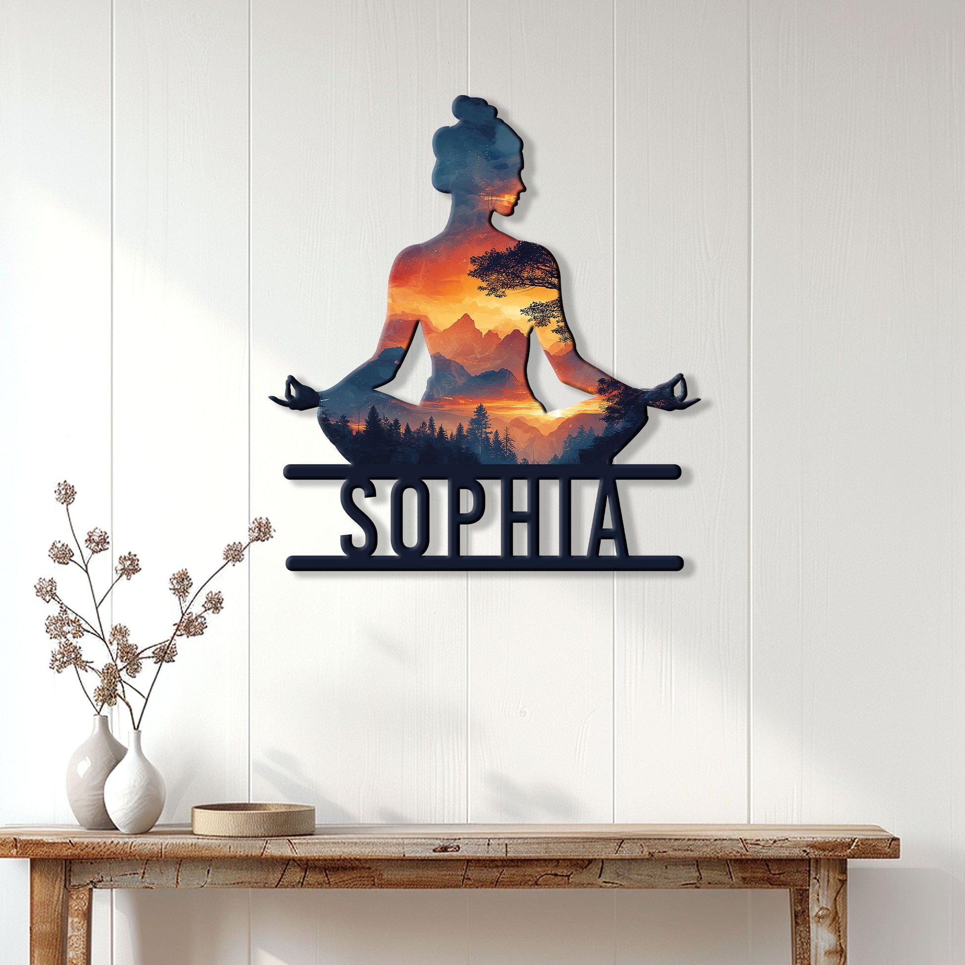Yoga wall decor displayed on a light wood-paneled wall above a console table