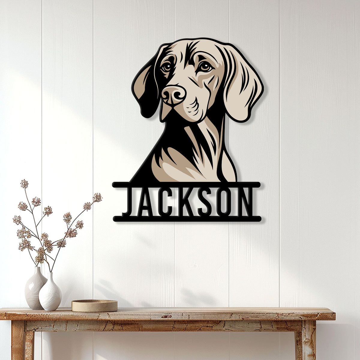 Weimaraner metal wall sign displayed on a light paneled wall above a rustic entryway table