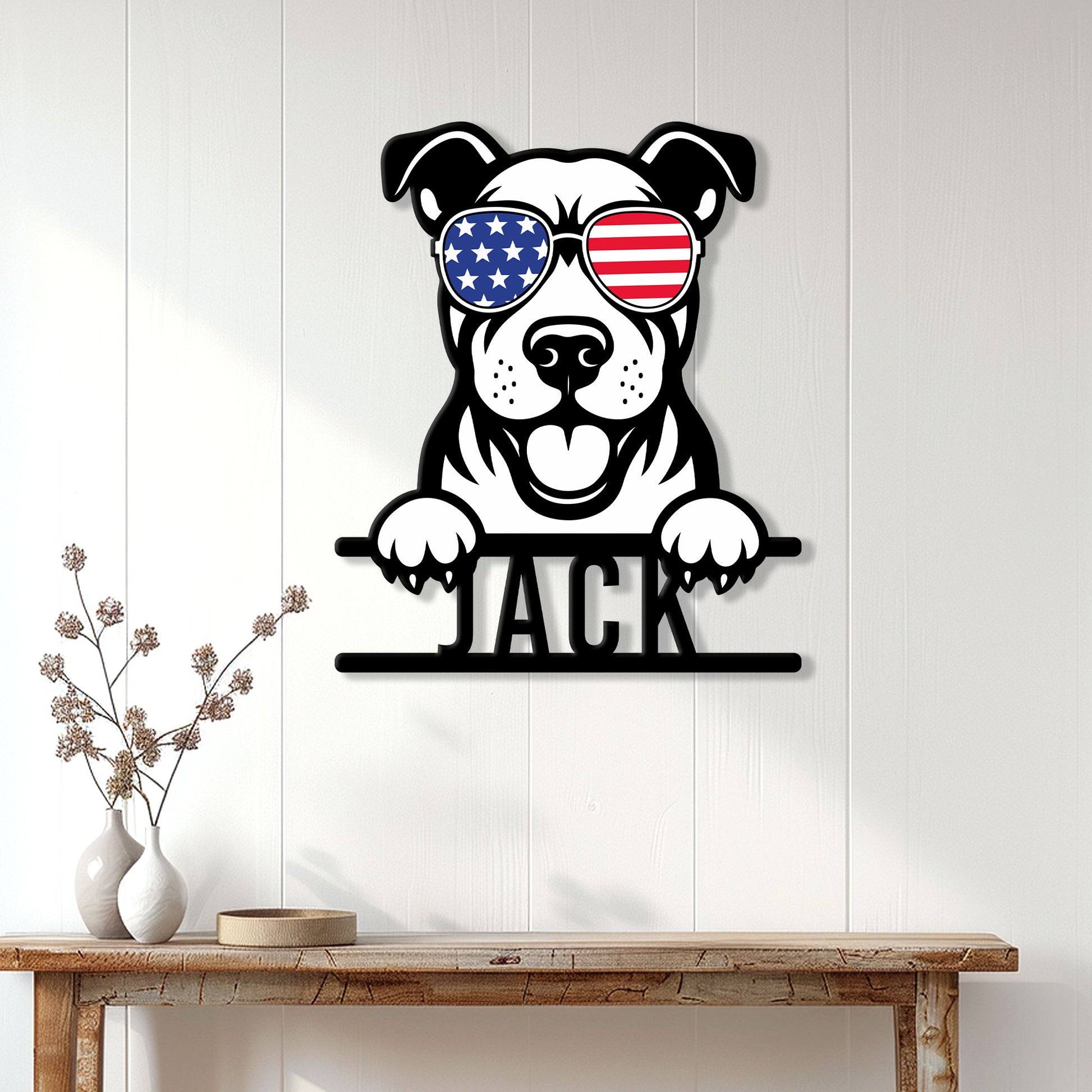 American Staffordshire Terrier metal sign displayed on a light wood-paneled wall above a console table