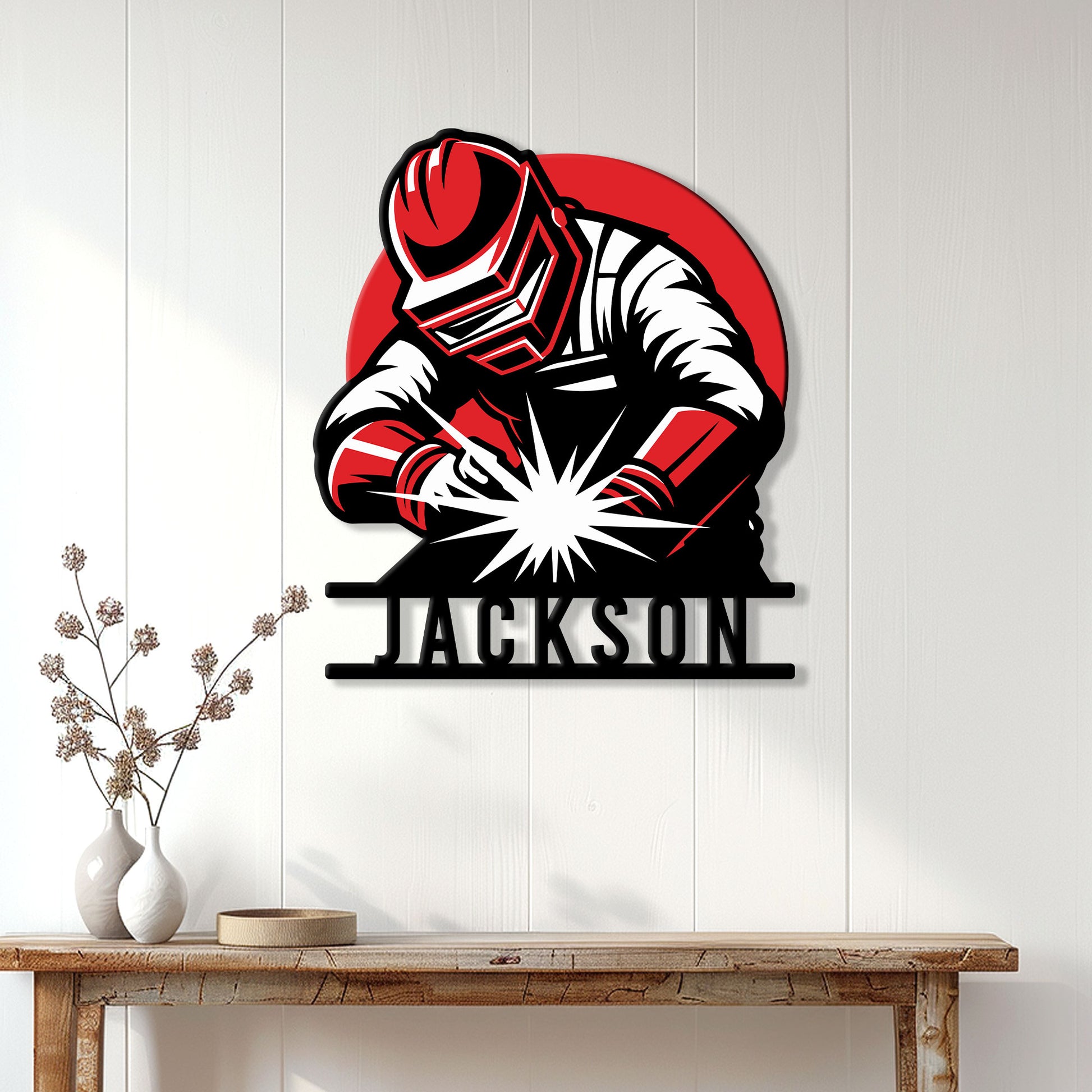 Welder metal wall sign displayed in a bright home interior above a wood console table