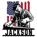 Patriotic welder metal sign featuring a protective helmet, welding torch, and American flag design