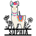 Colorful alpaca metal sign with a flower crown, patterned blanket, and floral accents