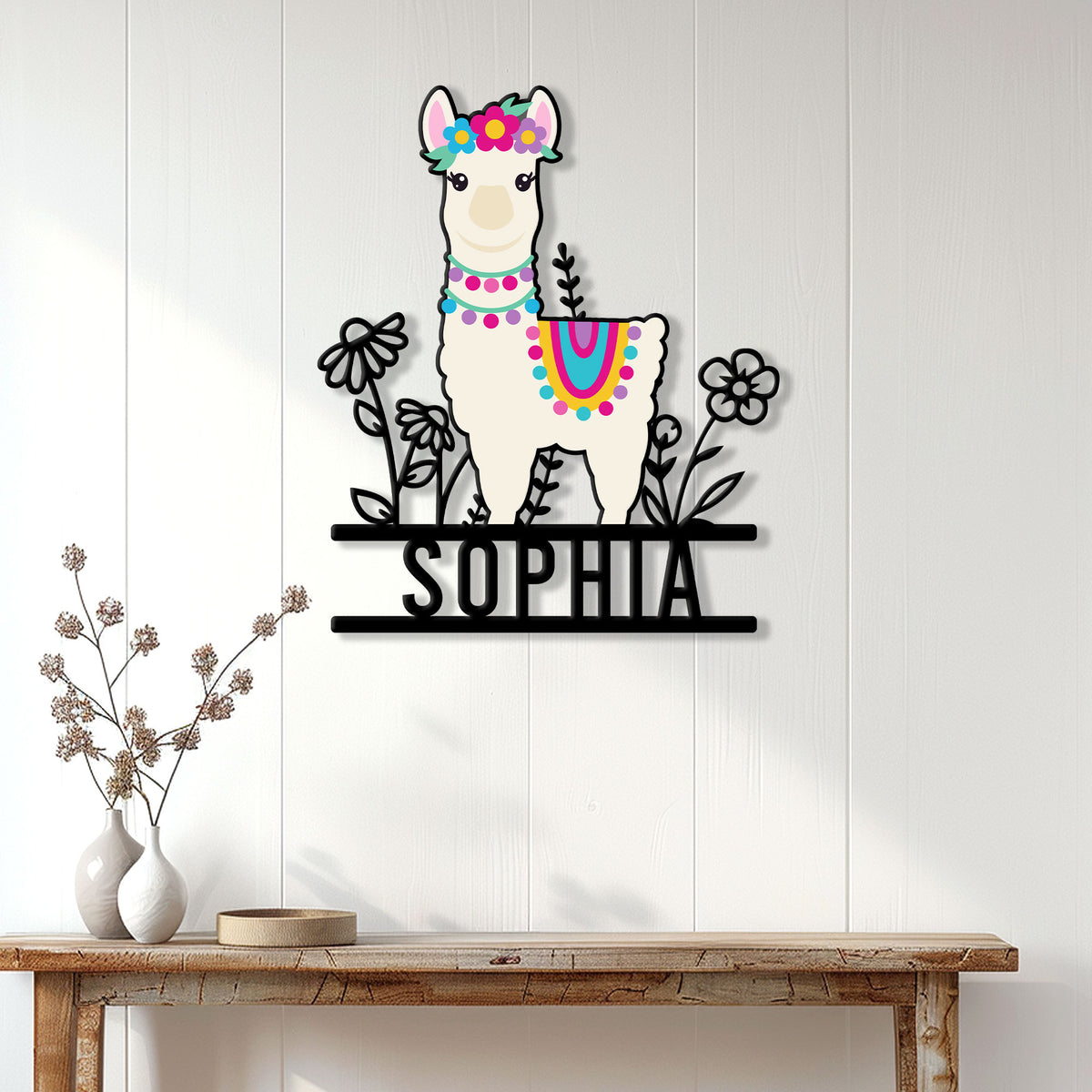 Colorful alpaca wall sign displayed on a bright wood-paneled entryway wall
